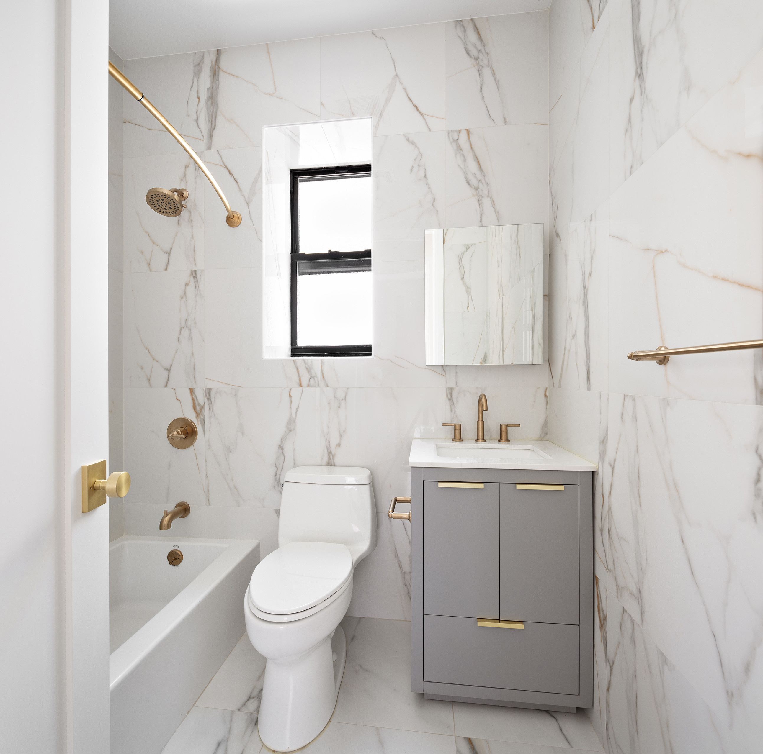 282 Buffalo Avenue, Unit 2 Brooklyn, NY 11213 - Photo 5 of 10 a bathroom with a sink a toilet and shower