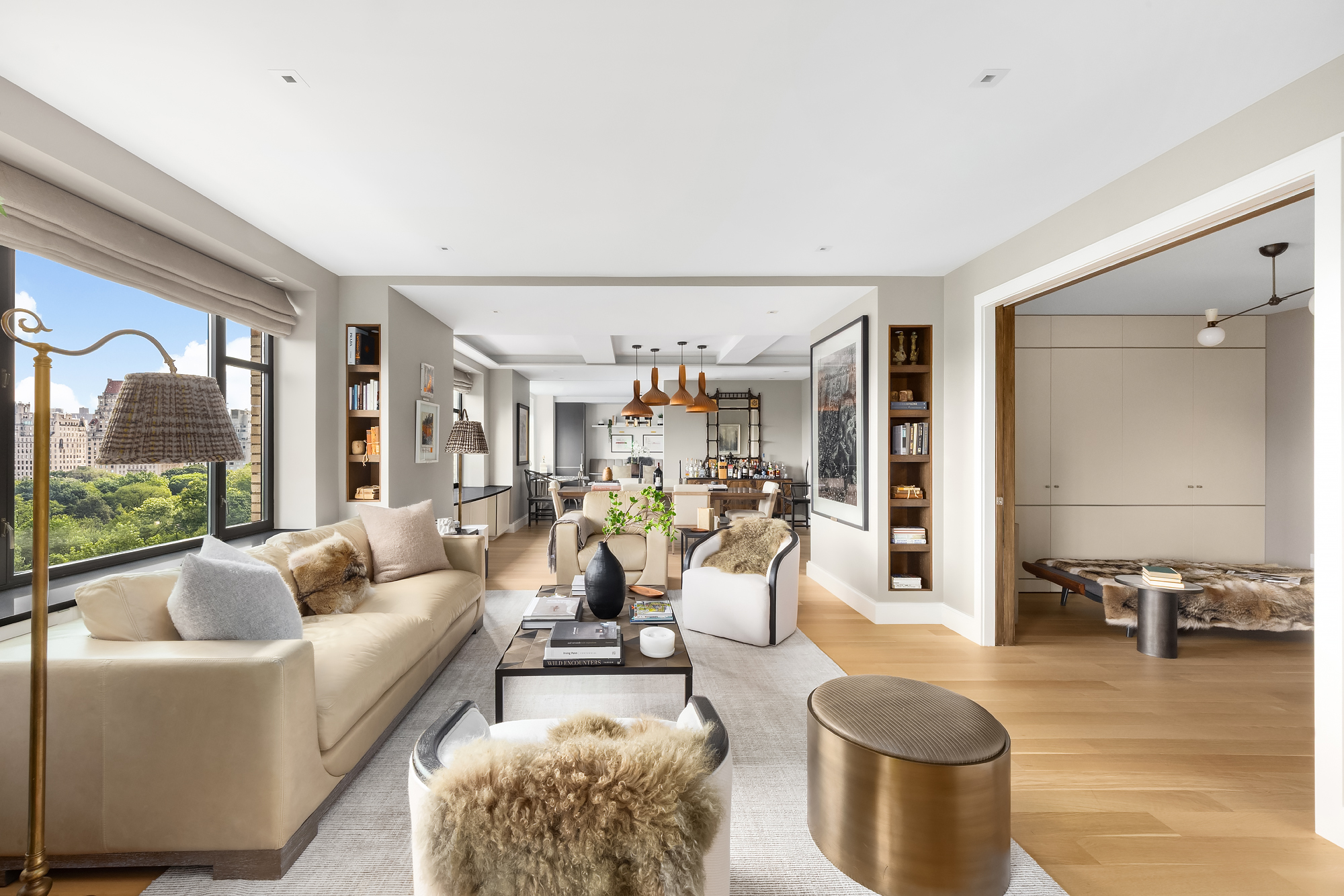 110 Central Park South, Unit 12ABC Manhattan, NY 10019 - Photo 10 of 49 a living room with furniture and a large window