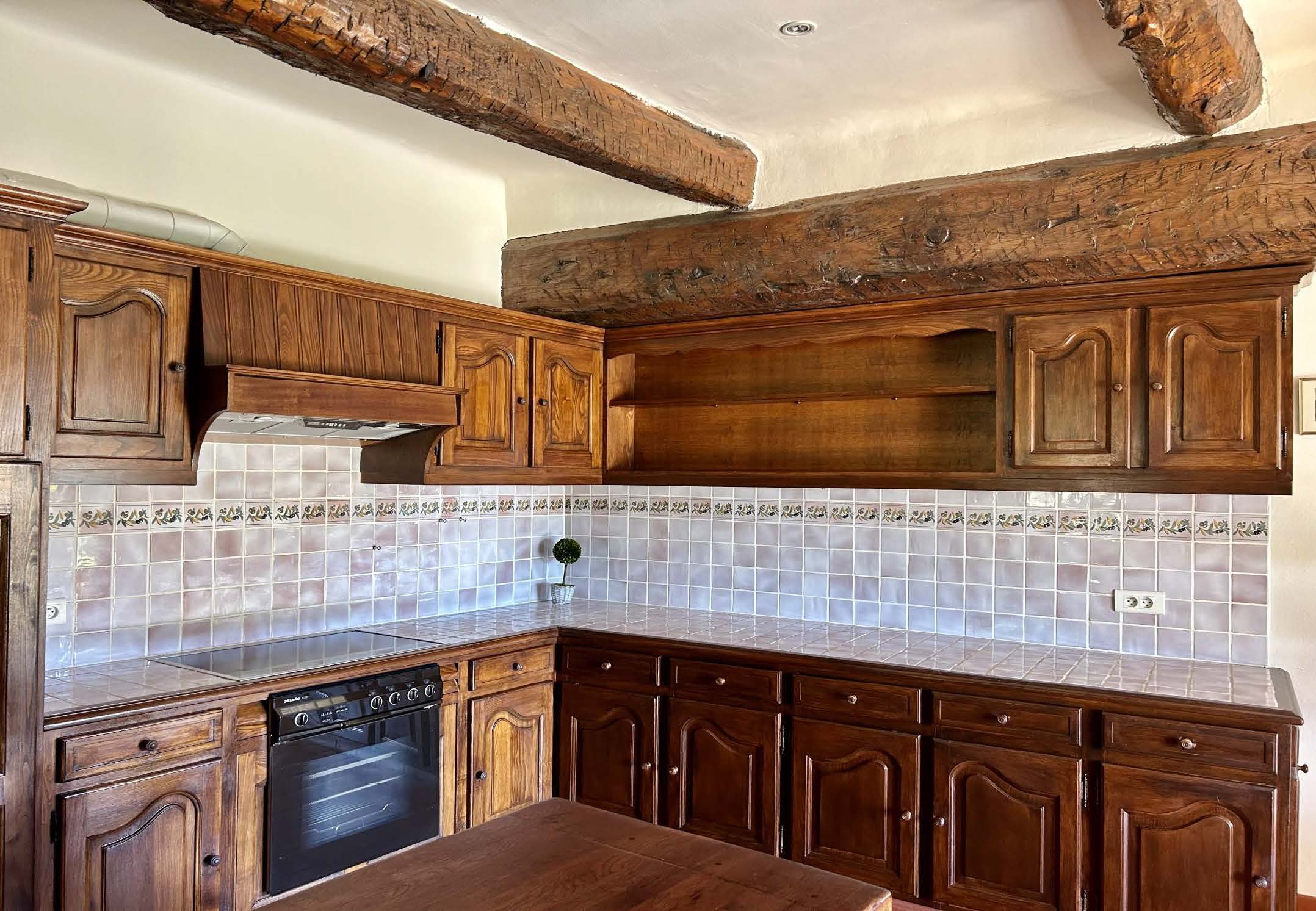 Le Vieux Moulin Provence-Alpes-Côte d’Azur, undefined 83630 - Photo 9 of 21 a kitchen with stainless steel appliances granite countertop a sink and cabinets