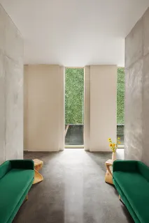 a living room with a table and a window