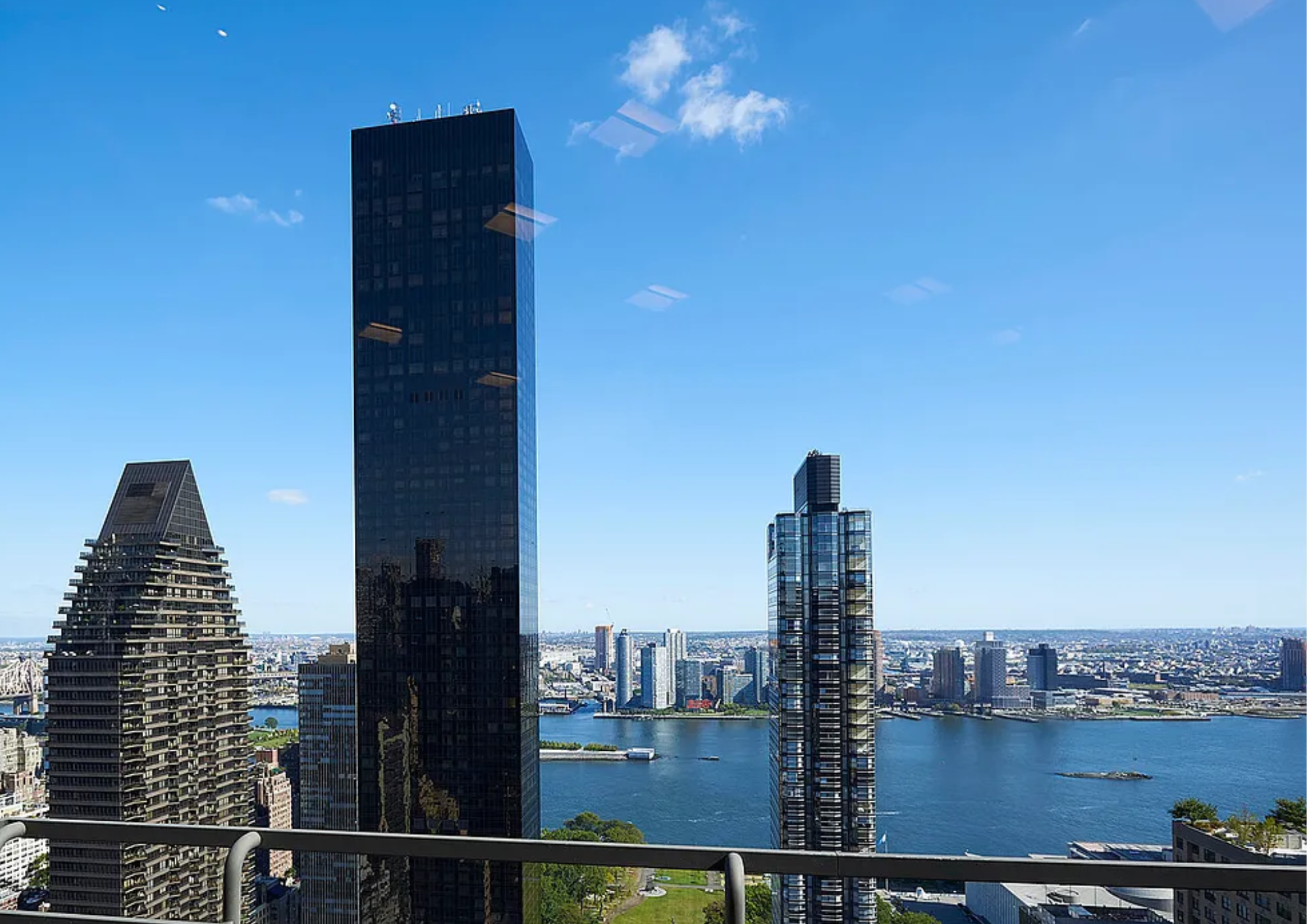 240 East 47th Street, Unit 4B Manhattan, NY 10017 - Photo 22 of 25 a view of a city with tall buildings