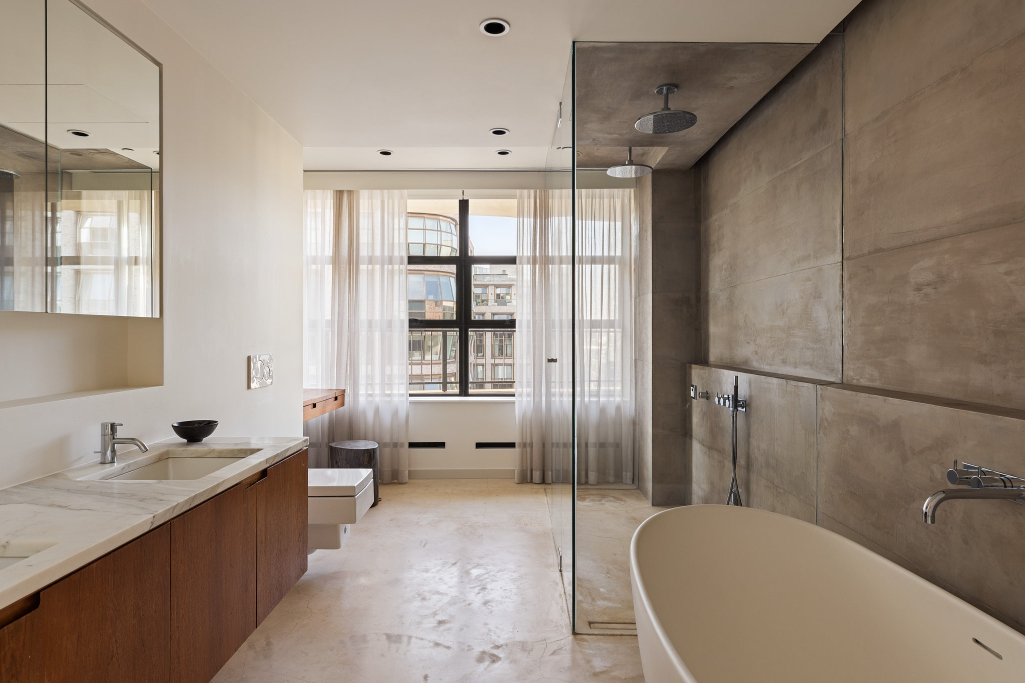 456 West 19th Street, Unit PHH Manhattan, NY 10011 - Photo 12 of 21 a spacious bathroom with a tub sink shower and mirror