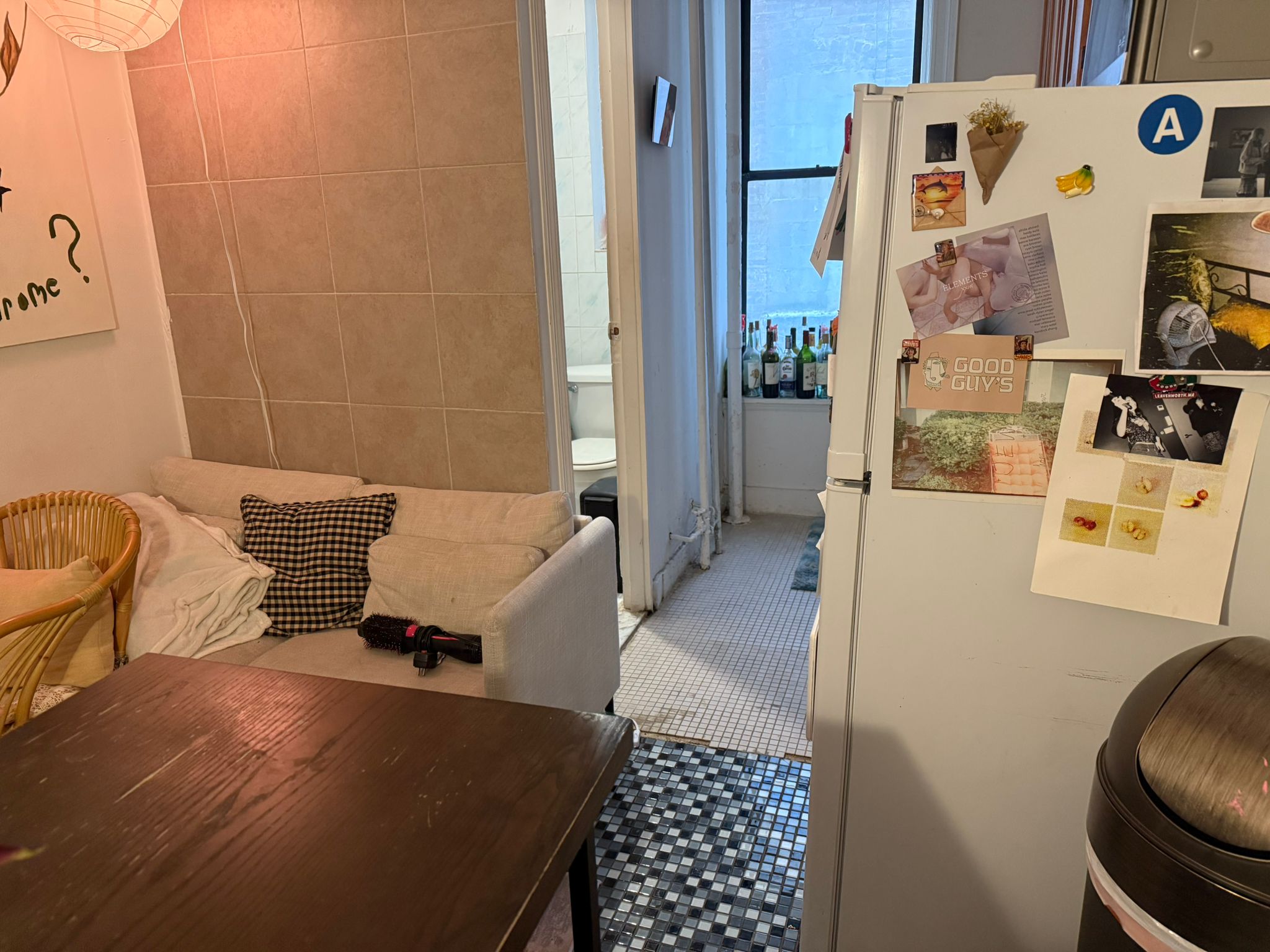 1278 1st Avenue, Unit 2 Manhattan, NY 10065 - Photo 9 of 19 a living room with furniture and a table