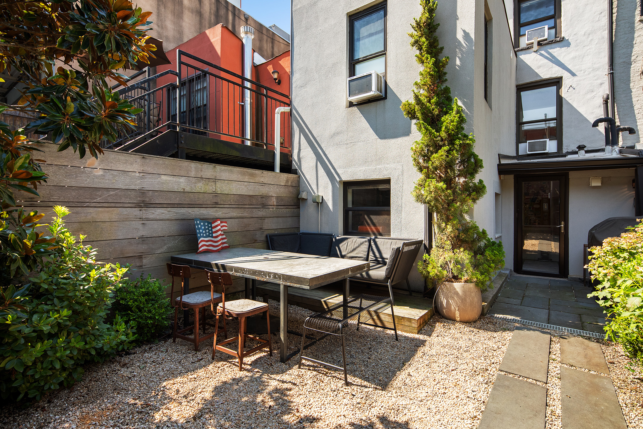 114 Pioneer Street Brooklyn, NY 11231 - Photo 15 of 17 a view of a dinning table and a chairs in a patio
