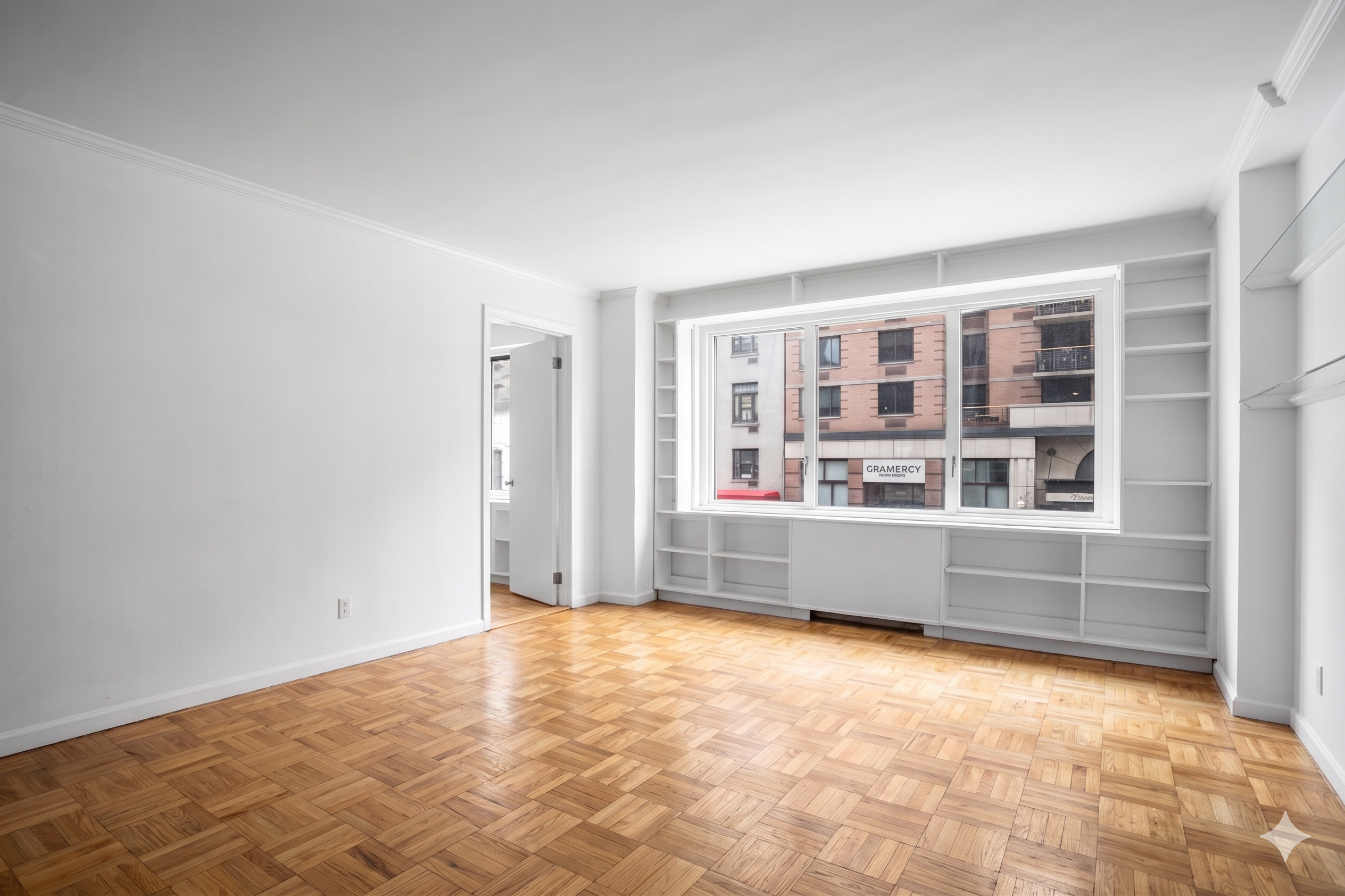 201 East 25th Street, Unit 2FG Manhattan, NY 10010 - Photo 3 of 16 a view of an empty room with a window