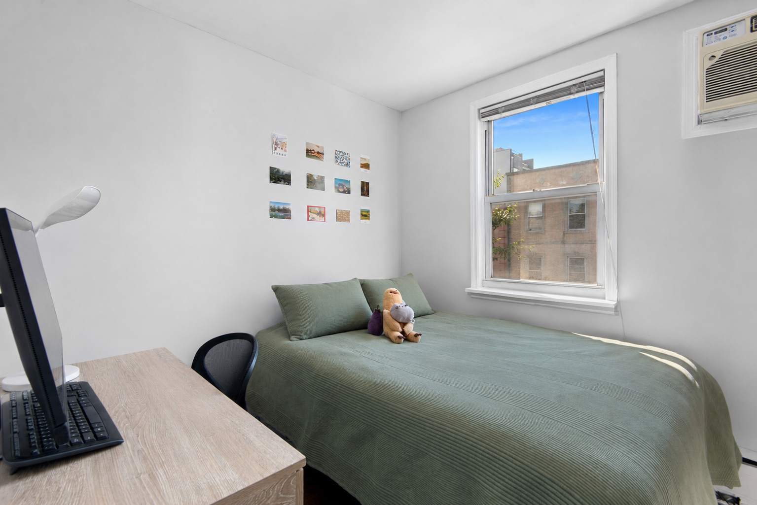 269 Ainslie Street, Unit 2 Brooklyn, NY 11211 - Photo 3 of 11 a bedroom with a bed and wooden floor