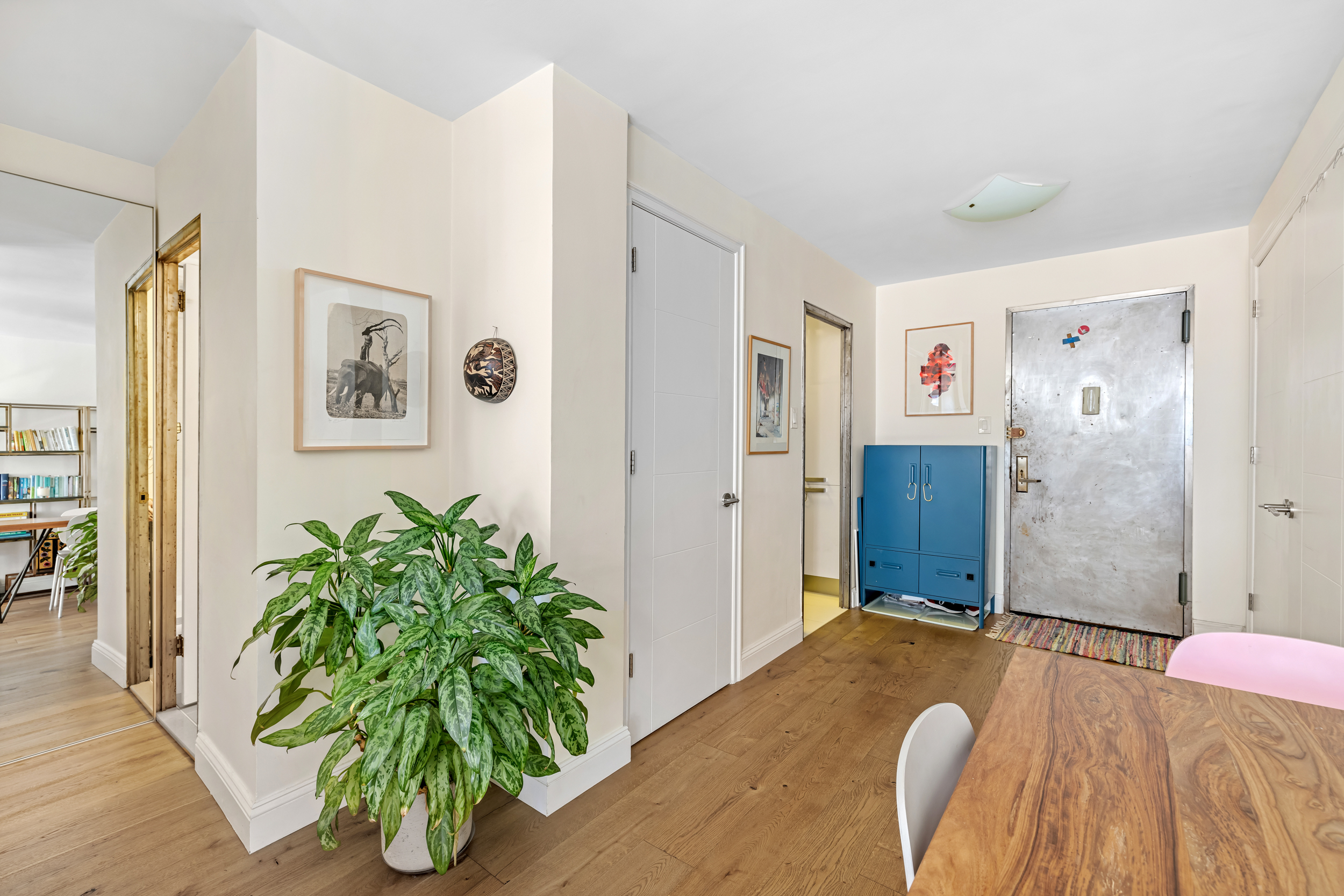 330 3rd Avenue, Unit 18F Manhattan, NY 10010 - Photo 5 of 10 a bedroom with a bed and a potted plant