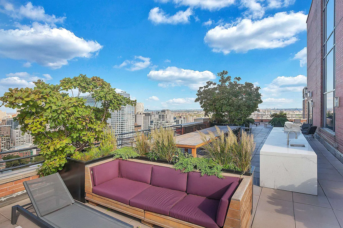 300 East 64th Street, Unit 26B Manhattan, NY 10065 - Photo 25 of 26 a sitting area with furniture and city view