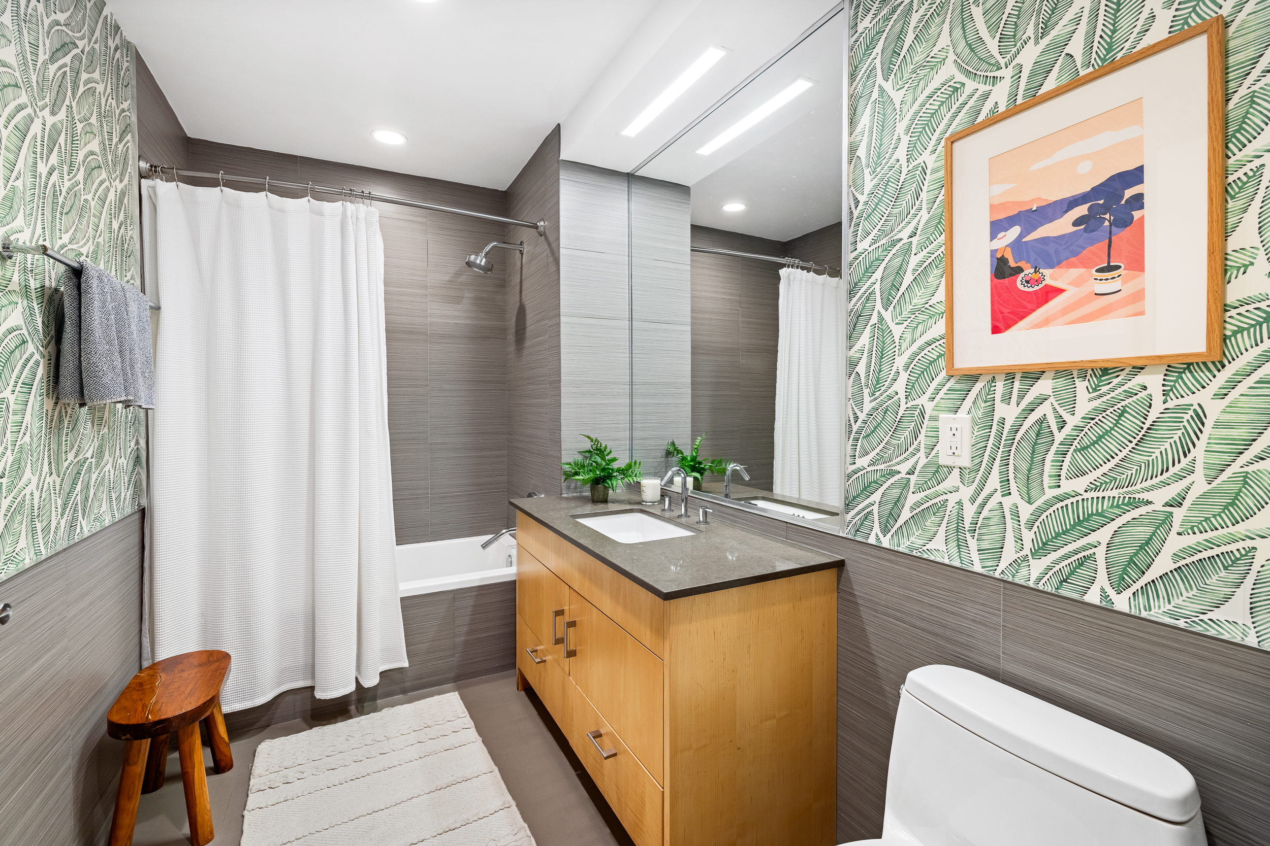 47 Dean Street, Unit 3B Brooklyn, NY 11201 - Photo 10 of 11 a bathroom with a granite countertop sink and a mirror