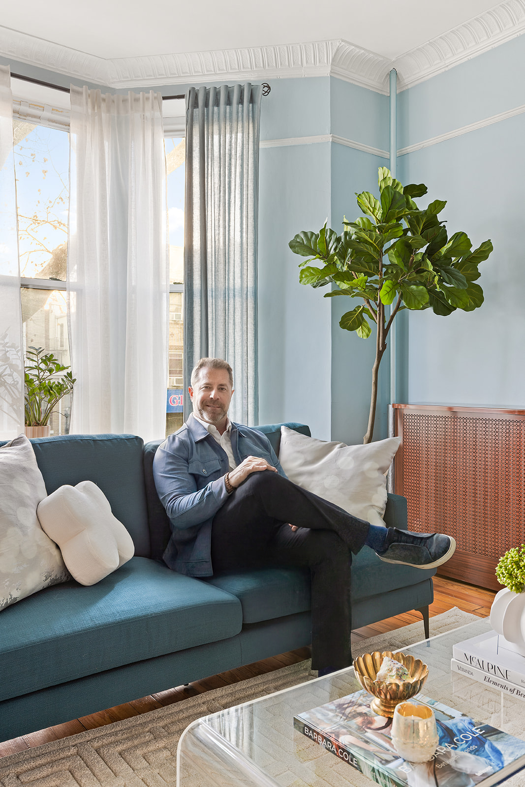 521 84th Street Brooklyn, NY 11209 - Photo 18 of 19 a living room with furniture and a potted plant