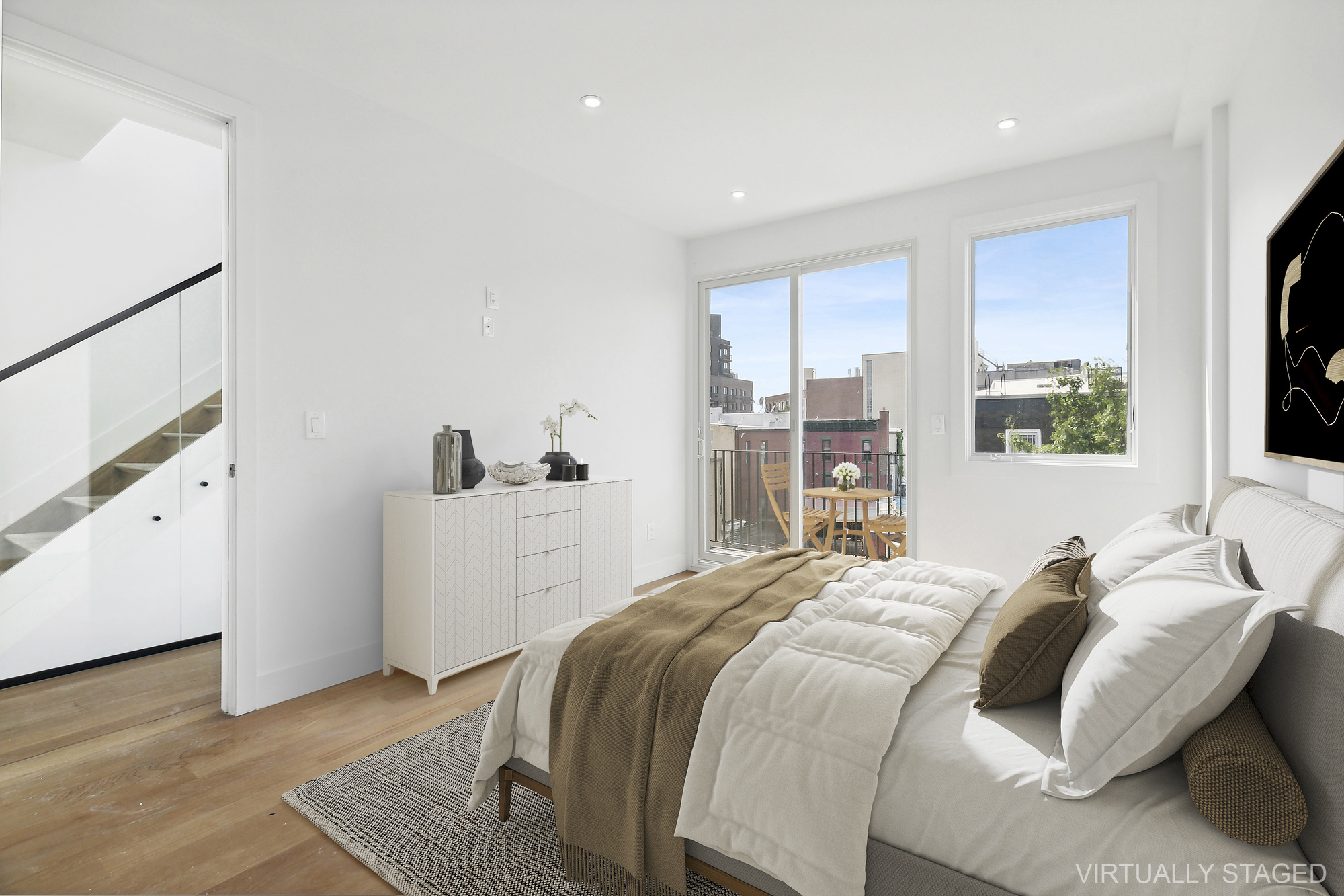 483 Hart Street, Unit 2 Brooklyn, NY 11221 - Photo 6 of 17 a bedroom with a bed and a window