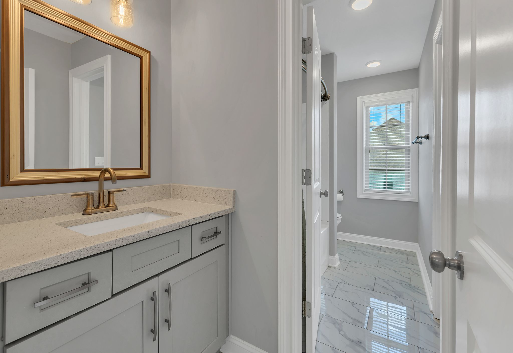 1484 Overlook Point Clarksville, TN 37043 - Photo 39 of 53 a bathroom with a granite countertop sink and a mirror