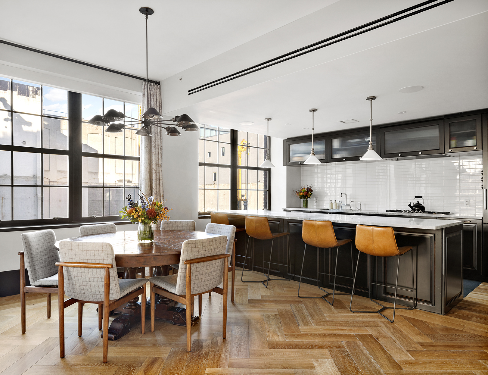 51 Jay Street, Unit 3C Brooklyn, NY 11201 - Photo 2 of 10 a kitchen with stainless steel appliances granite countertop a stove a sink and a refrigerator