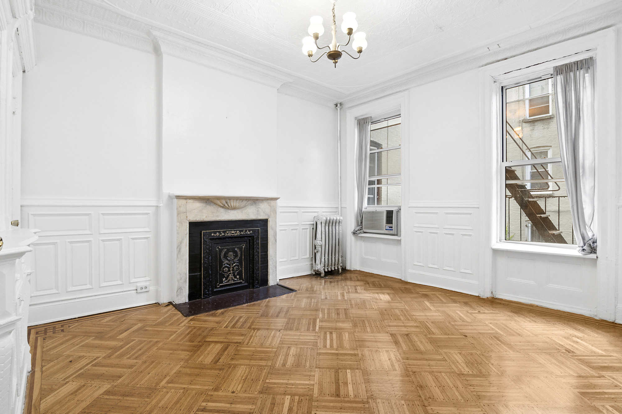 271 6th Avenue, Unit 2 Brooklyn, NY 11215 - Photo 6 of 8 a view of an empty room with a window
