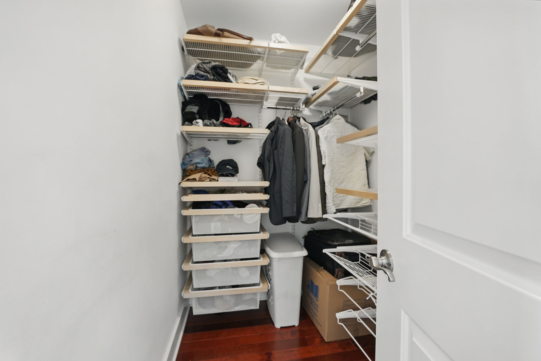 28 Q Street Northeast, Unit 2 Washington, DC 20002 - Photo 27 of 41 a view of walk in closet with clothes and shoes