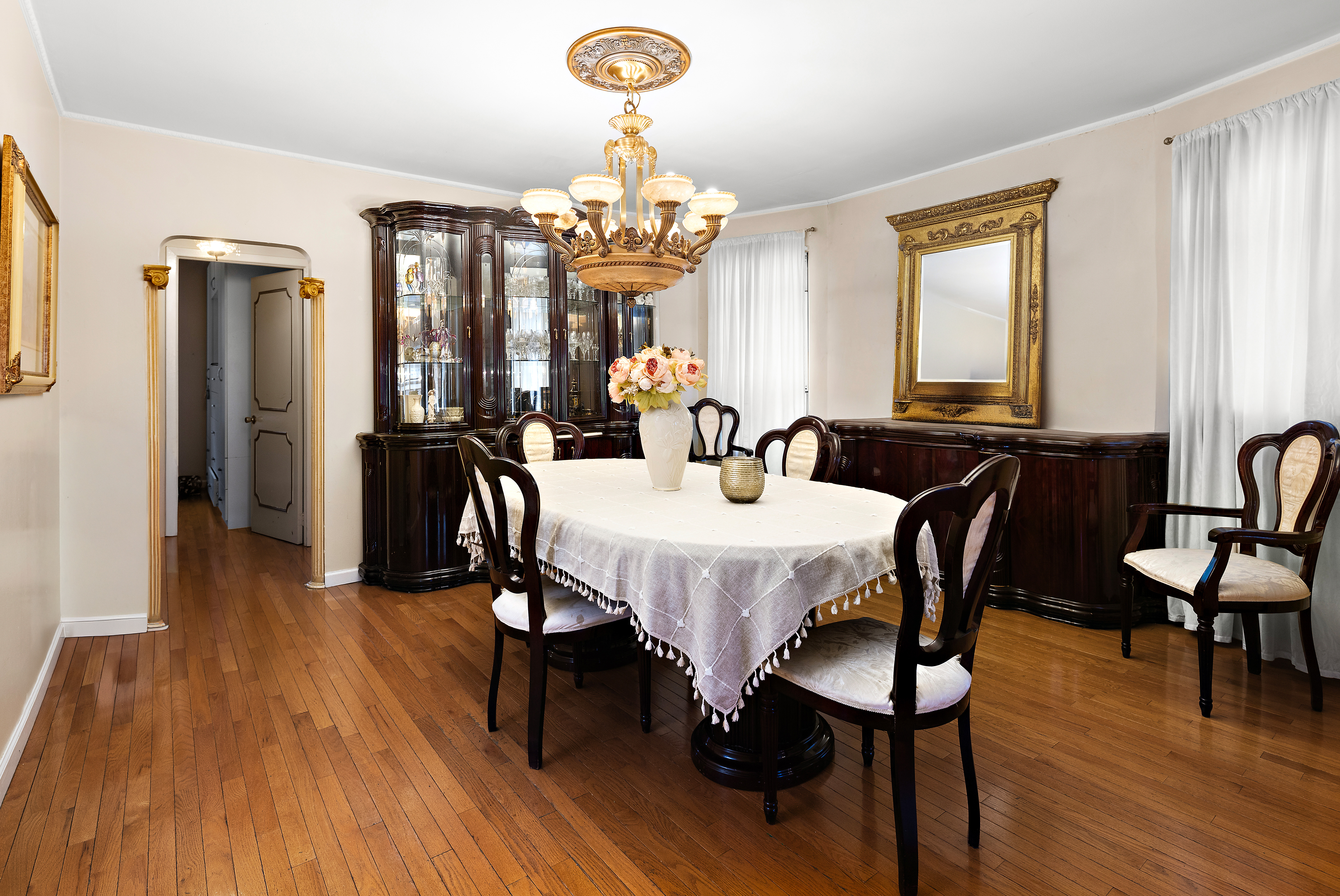 562 84th Street Brooklyn, NY 11209 - Photo 5 of 25 a view of a a dining room with furniture window and wooden floor