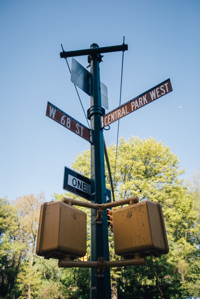 a balcony with furniture and city view