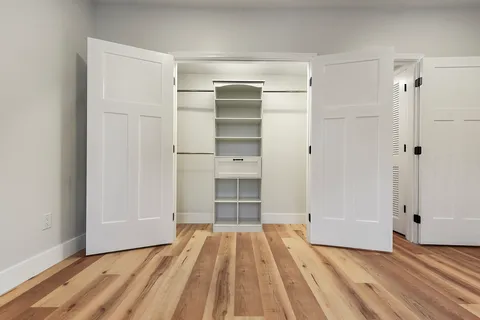 a view of staircase with white walls