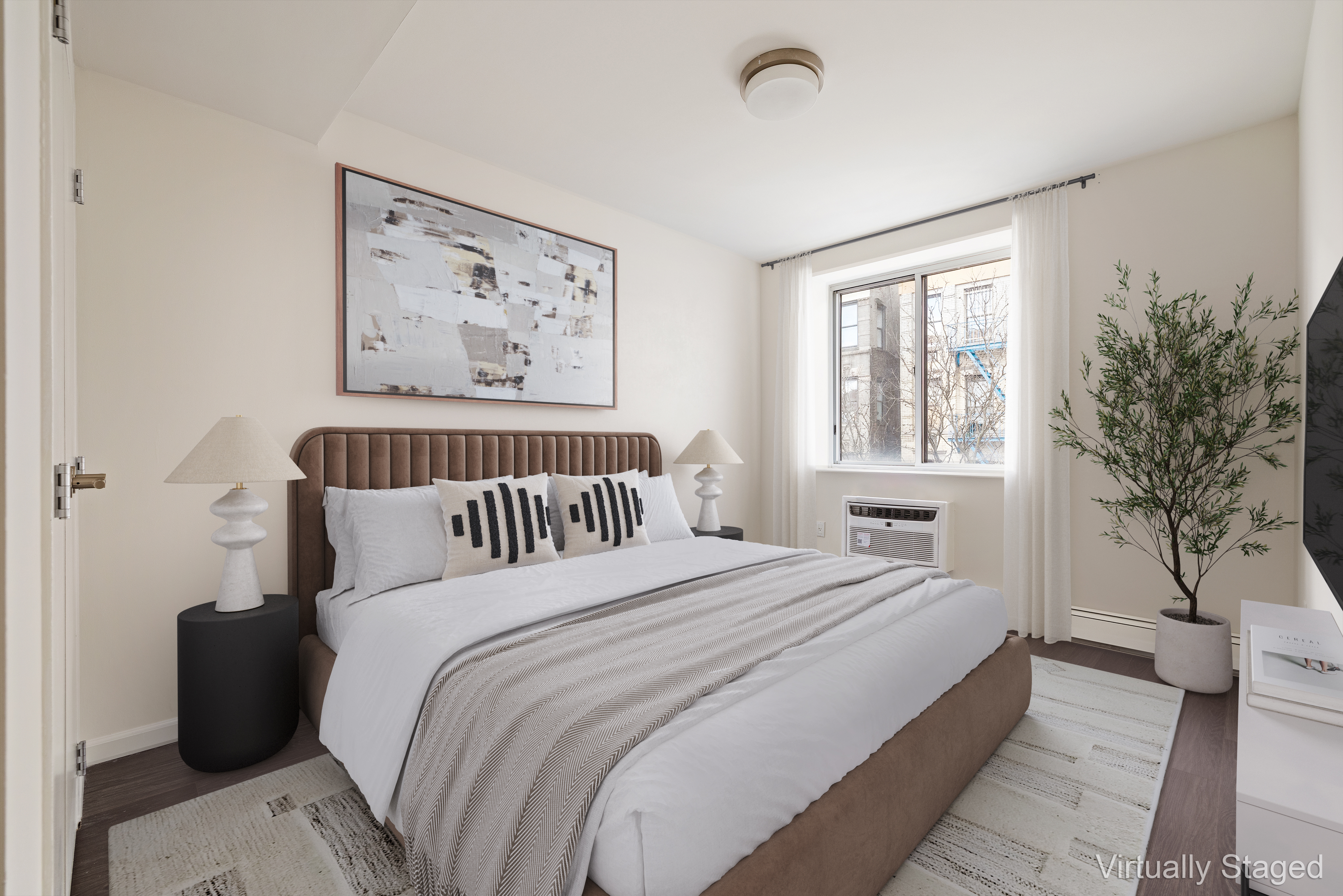 194 East 2nd Street, Unit 5L Manhattan, NY 10009 - Photo 1 of 12 a bedroom with bed painting on the wall and a window