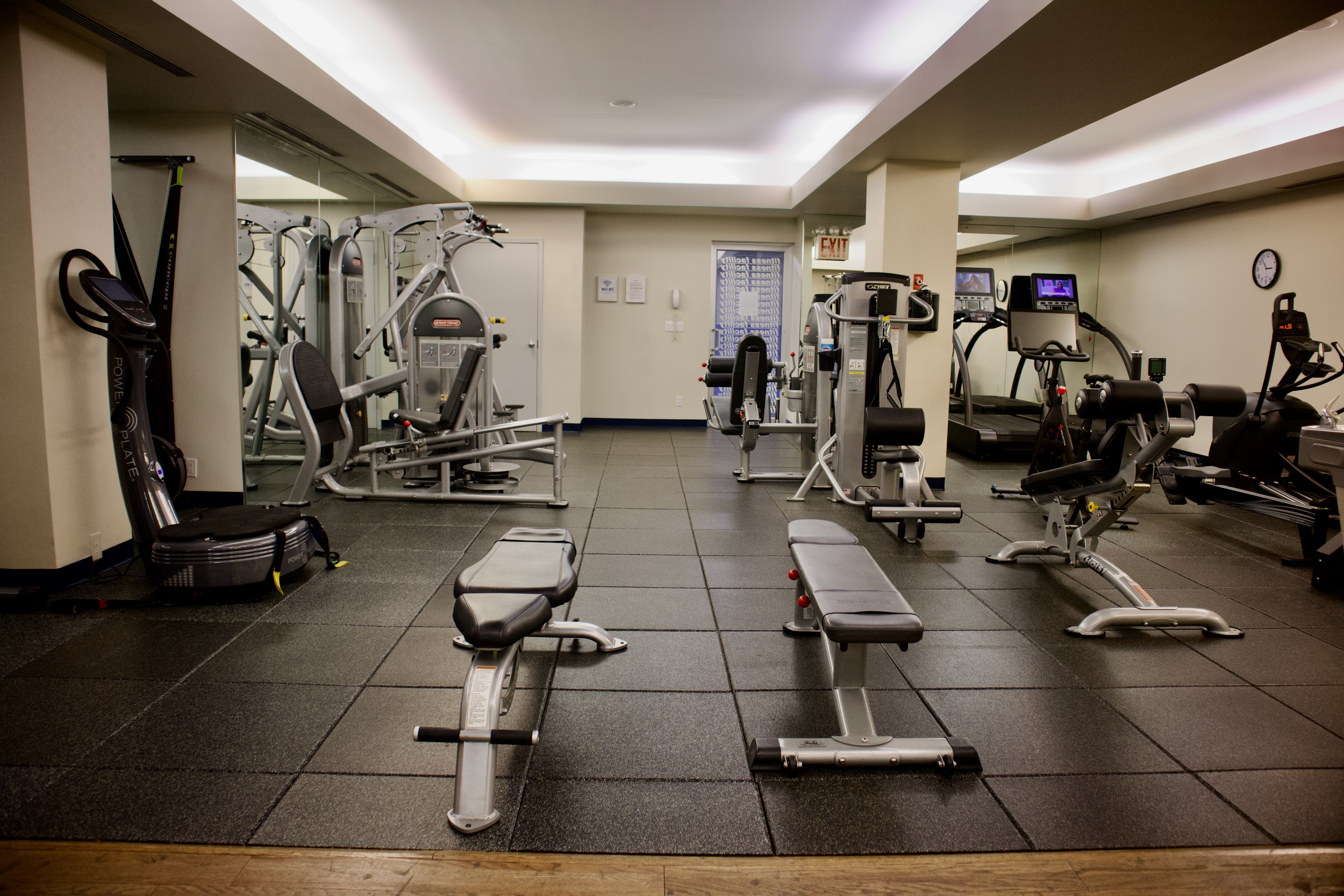 1175 Park Avenue, Unit 13B Manhattan, NY 10128 - Photo 9 of 12 a view of a room with gym equipment