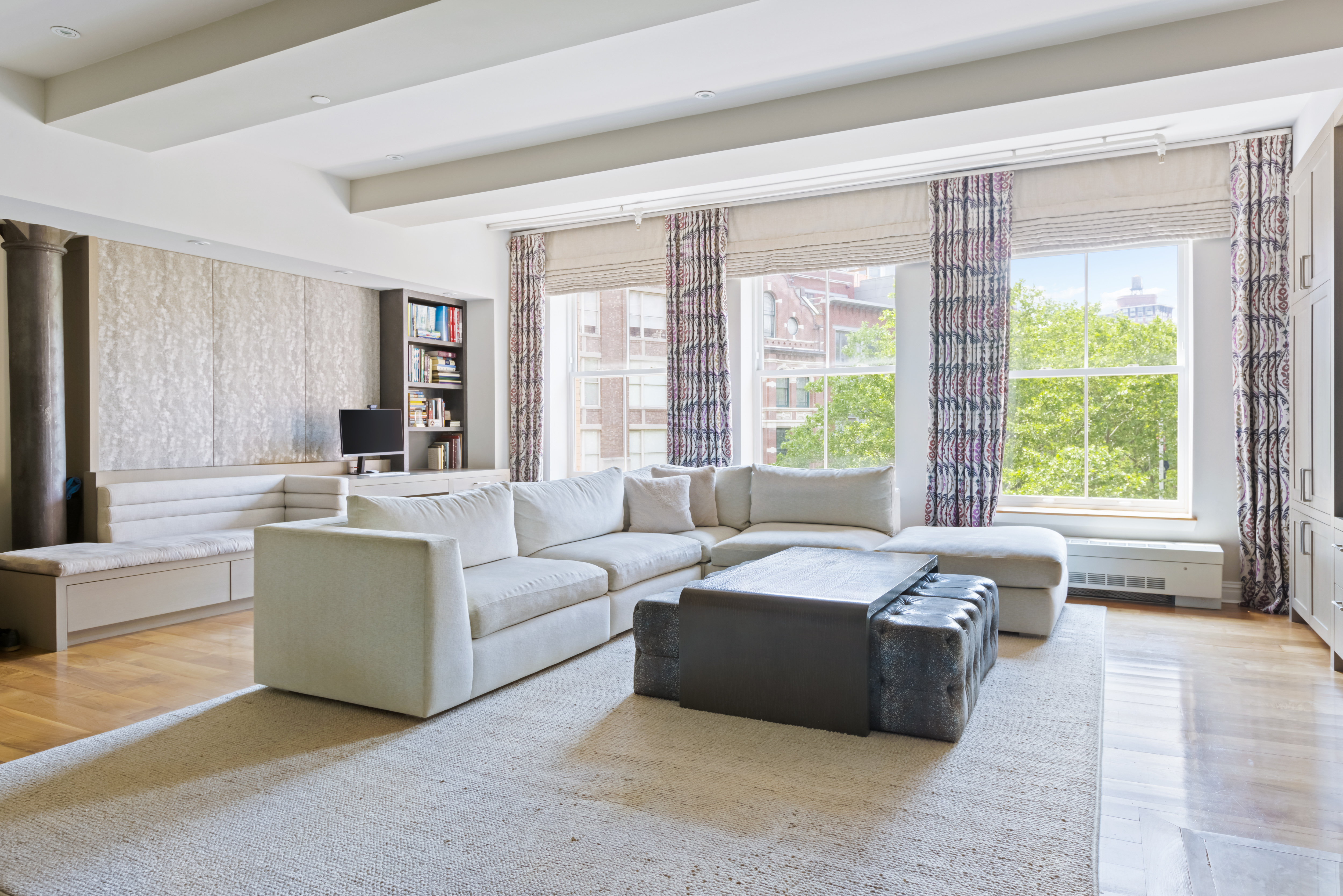 161 Duane Street, Unit 4B Manhattan, NY 10013 - Photo 2 of 12 a living room with furniture and a large window