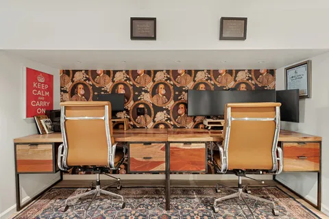 a bedroom with a bed and a couch