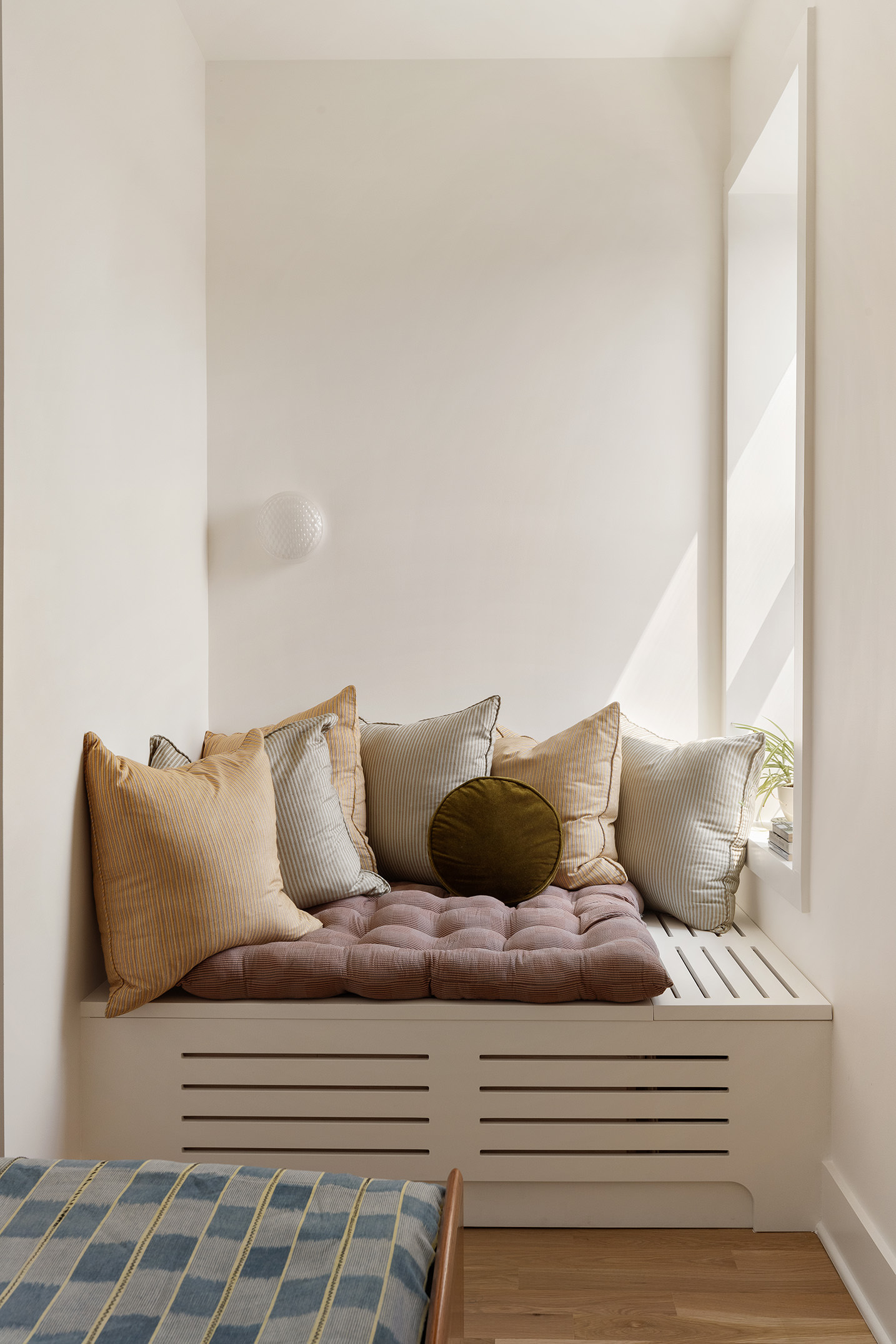 99 Avenue B, Unit PHDE Manhattan, NY 10009 - Photo 14 of 18 a living room with furniture and a couch