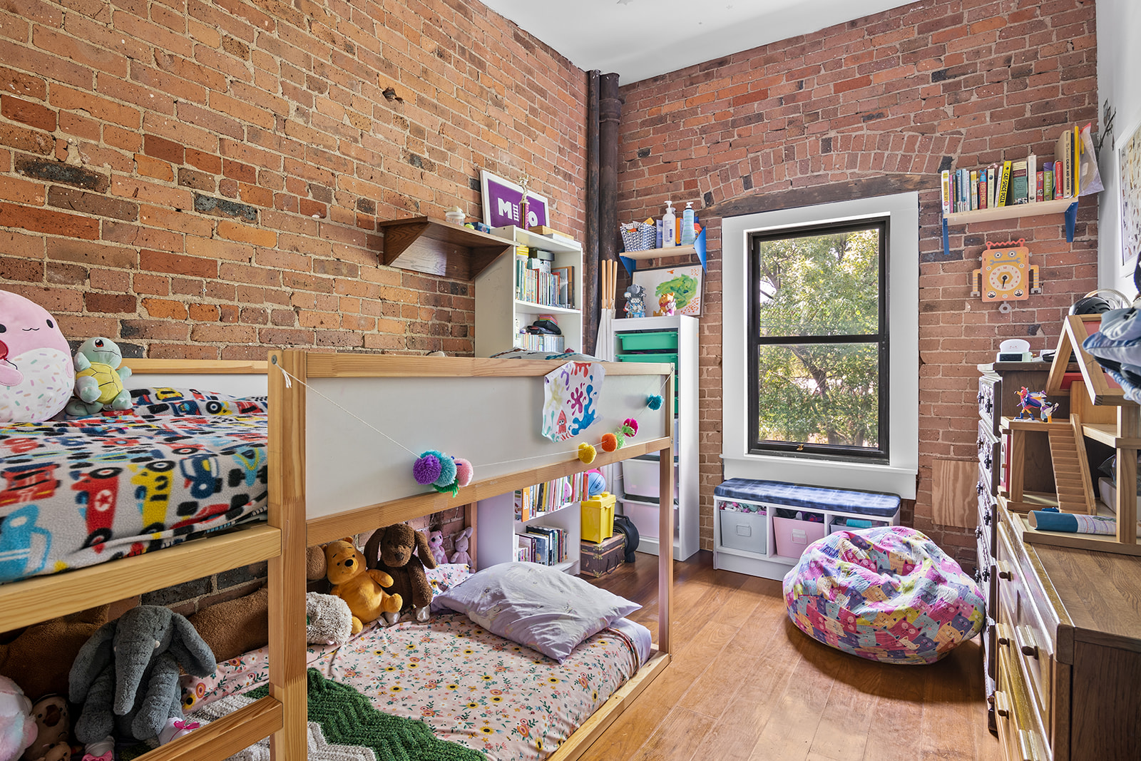 237 Hancock Street, Unit 13 Brooklyn, NY 11216 - Photo 3 of 7 a bedroom with furniture and a window