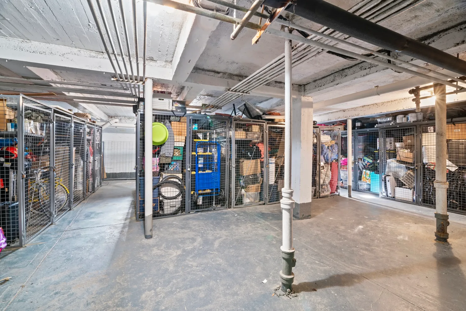 a view of a garage with a table and chairs