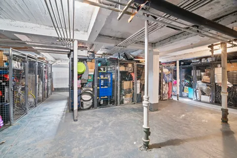 a view of a garage with a table and chairs