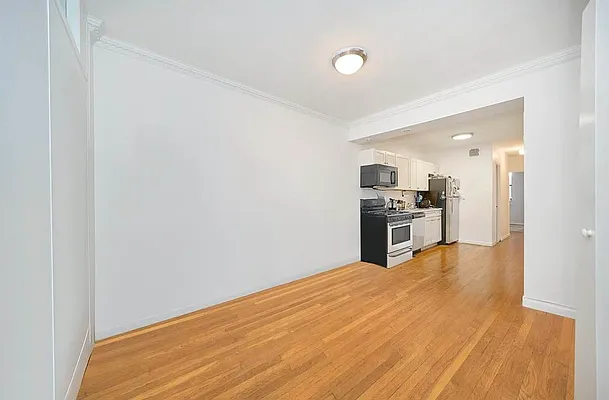 103 West 105th Street, Unit 2B Manhattan, NY 10025 - Photo 2 of 9 a view of a kitchen with a sink