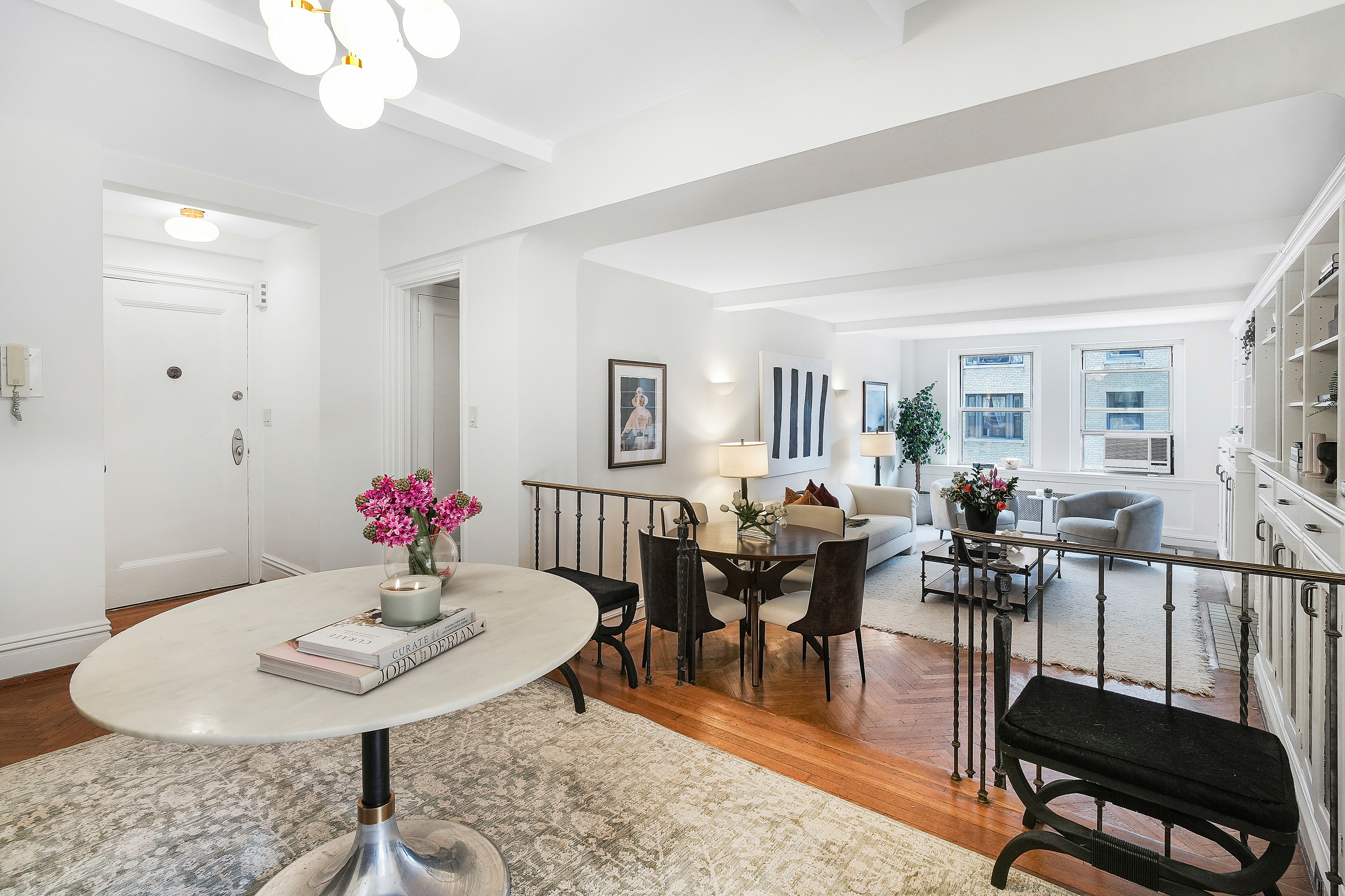 315 Riverside Drive, Unit 11B Manhattan, NY 10025 - Photo 3 of 19 a view of a dining room with furniture and wooden floor