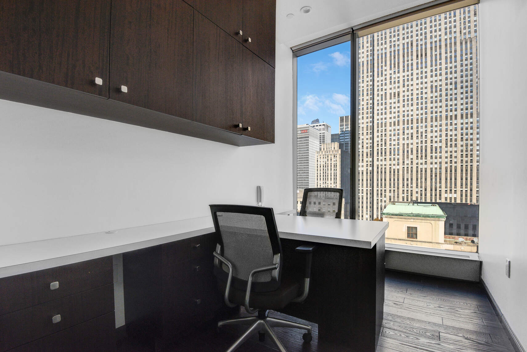 50 West 47th Street, Unit Undisclosed Manhattan, NY 10036 - Photo 5 of 27 a reading room with furniture and a window