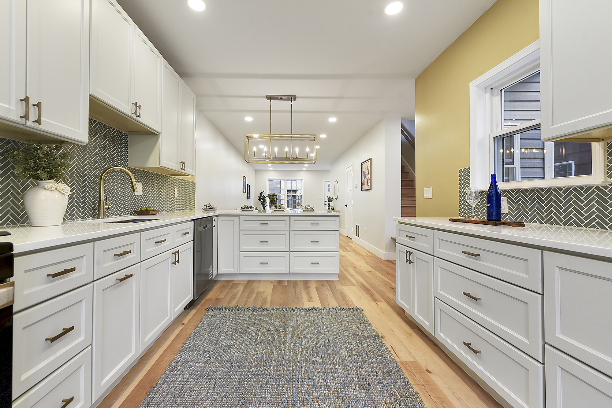 5412 Carnegie Street Pittsburgh, PA 15201 - Photo 18 of 55 a large white kitchen with cabinets