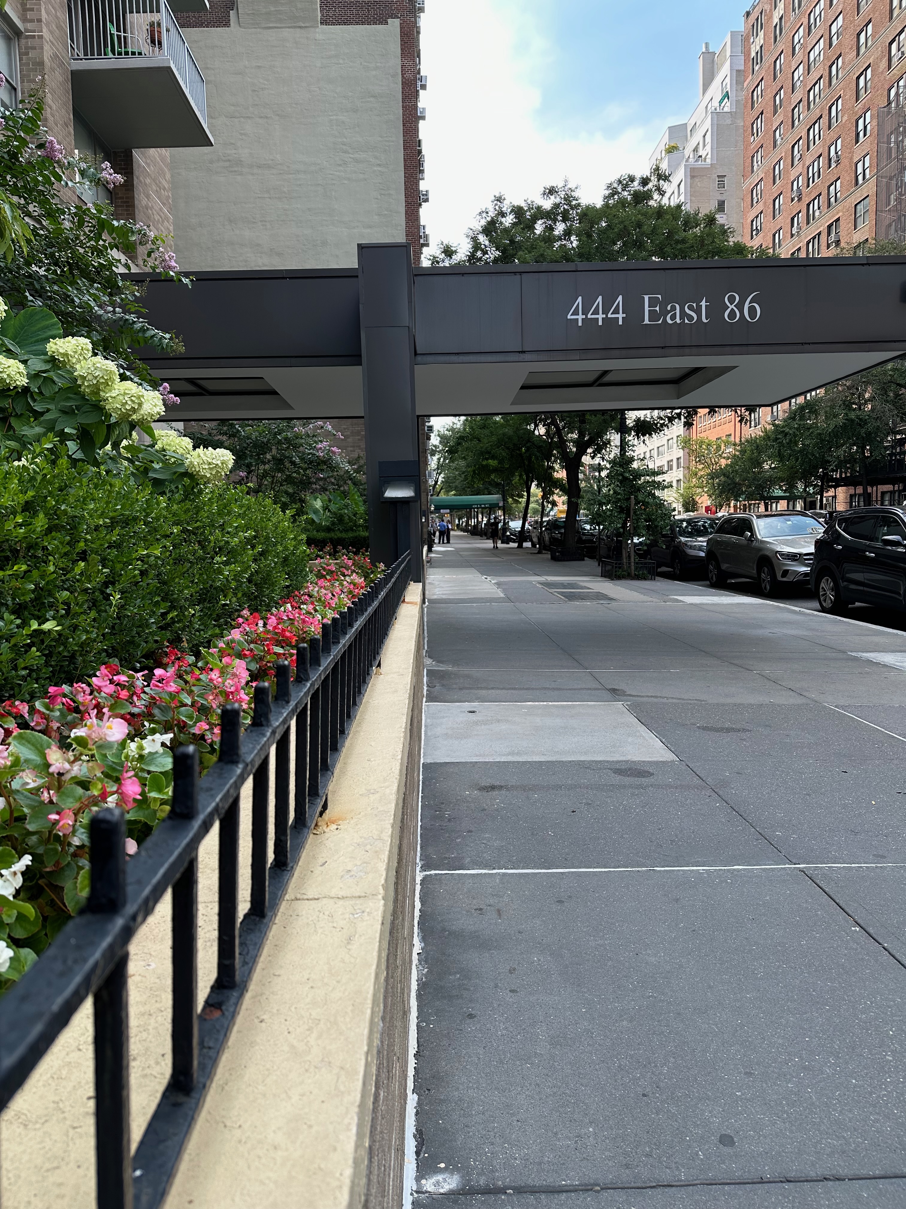 444 East 86th Street, Unit 4D Manhattan, NY 10028 - Photo 8 of 12 a view of a street with cars