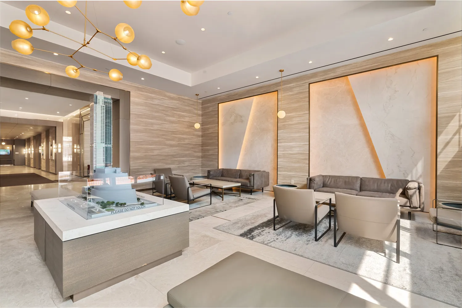 a living room with fireplace furniture and large windows