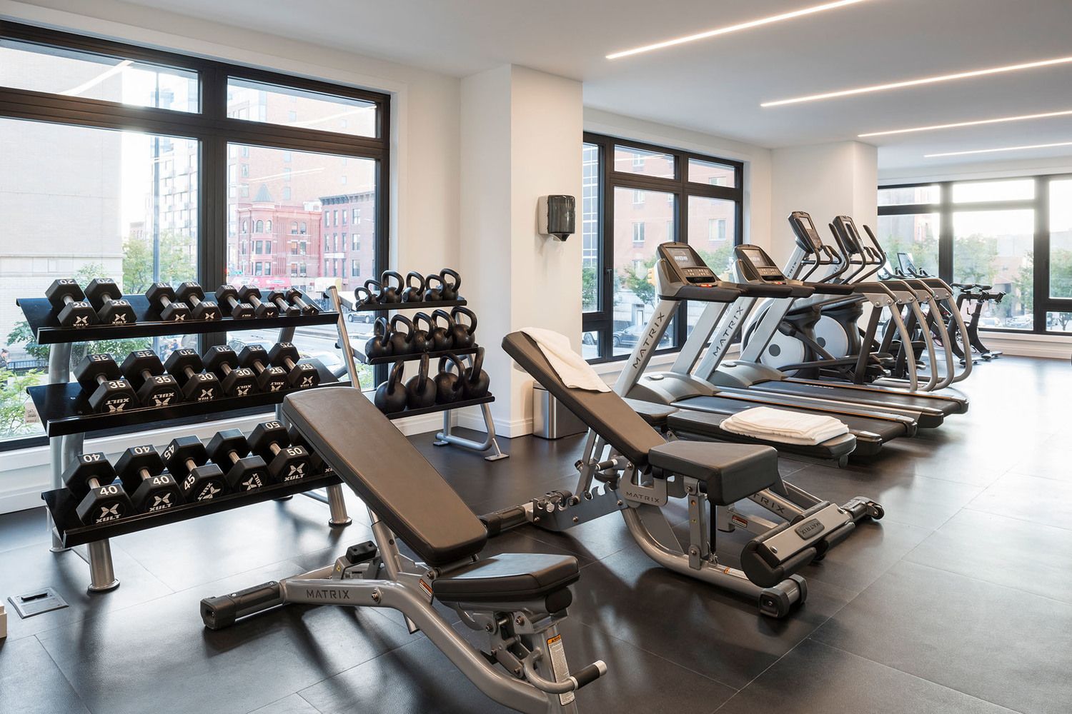 613 Baltic Street, Unit 2C Brooklyn, NY 11217 - Photo 14 of 16 a room with gym equipment and a large window