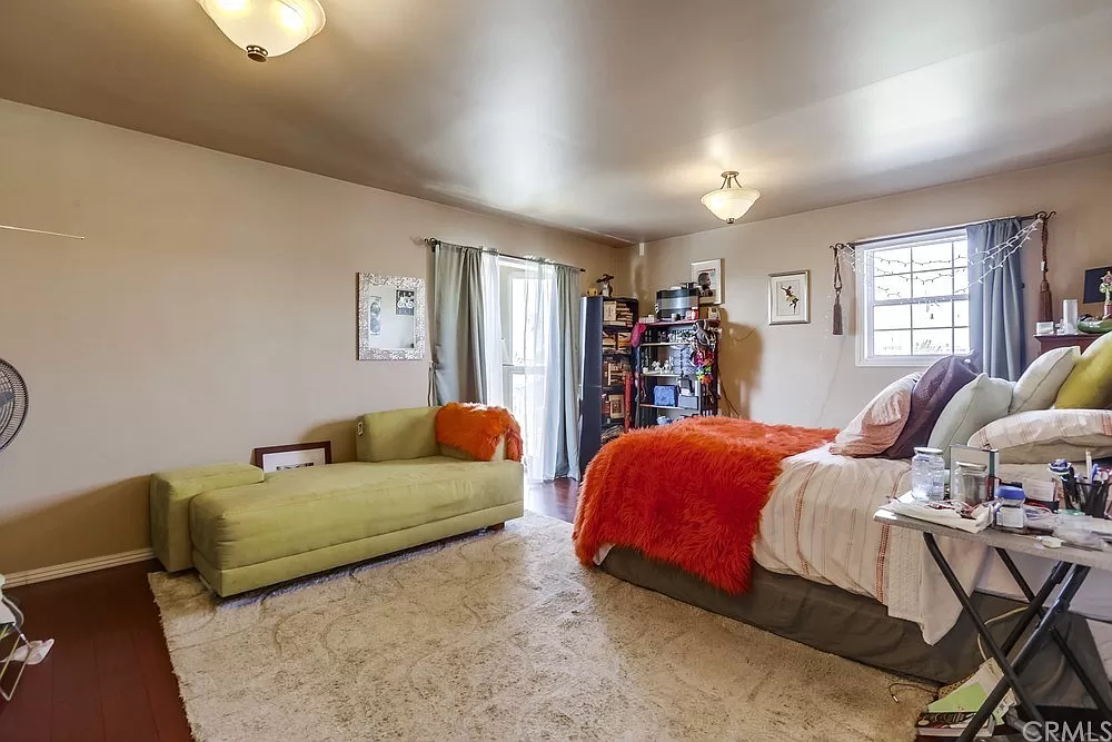 15604 Deblynn Avenue Gardena, CA 90248 - Photo 11 of 22 a bedroom with a bed and window
