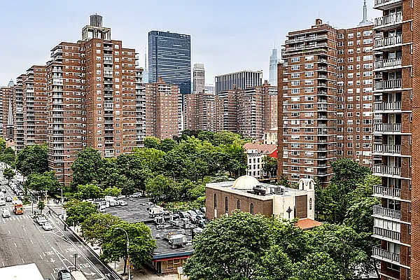 405 West 23rd Street, Unit 10D Manhattan, NY 10011 - Photo 5 of 9 a building view with large trees and plants