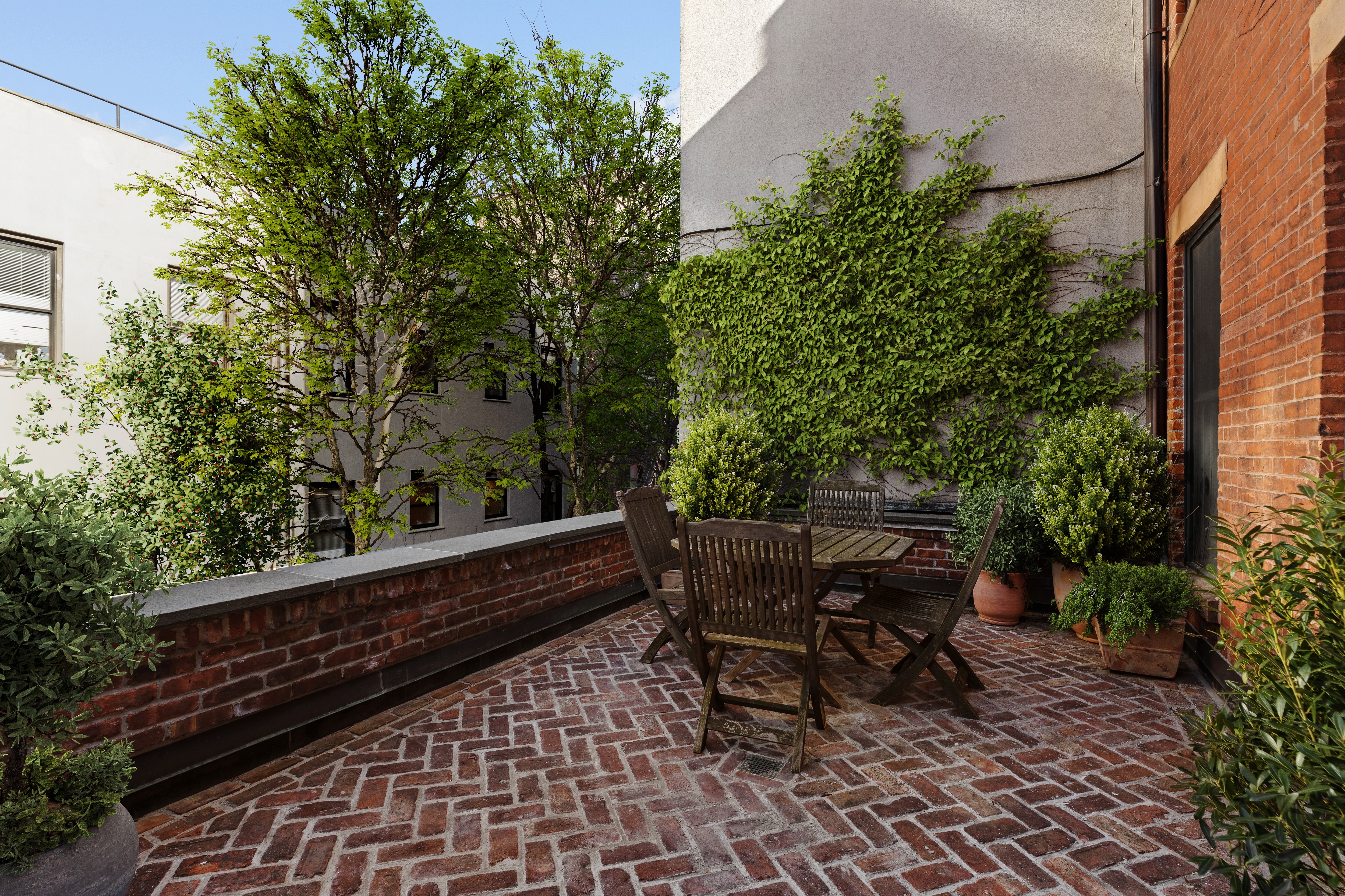 125 West 15th Street Manhattan, NY 10011 - Photo 22 of 28 a view of a bench in a patio