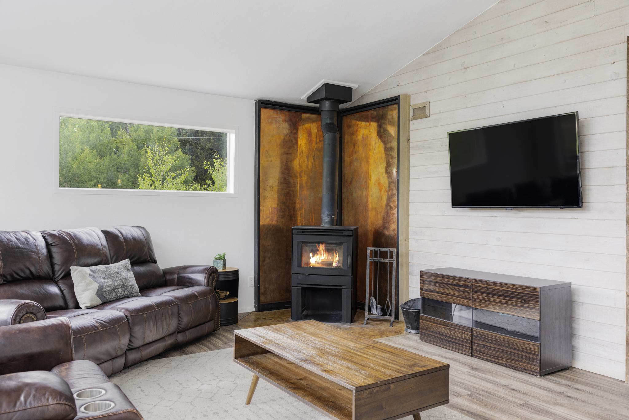 133 Gold Run Road Alma, CO 80420 - Photo 4 of 46 a living room with furniture and a flat screen tv