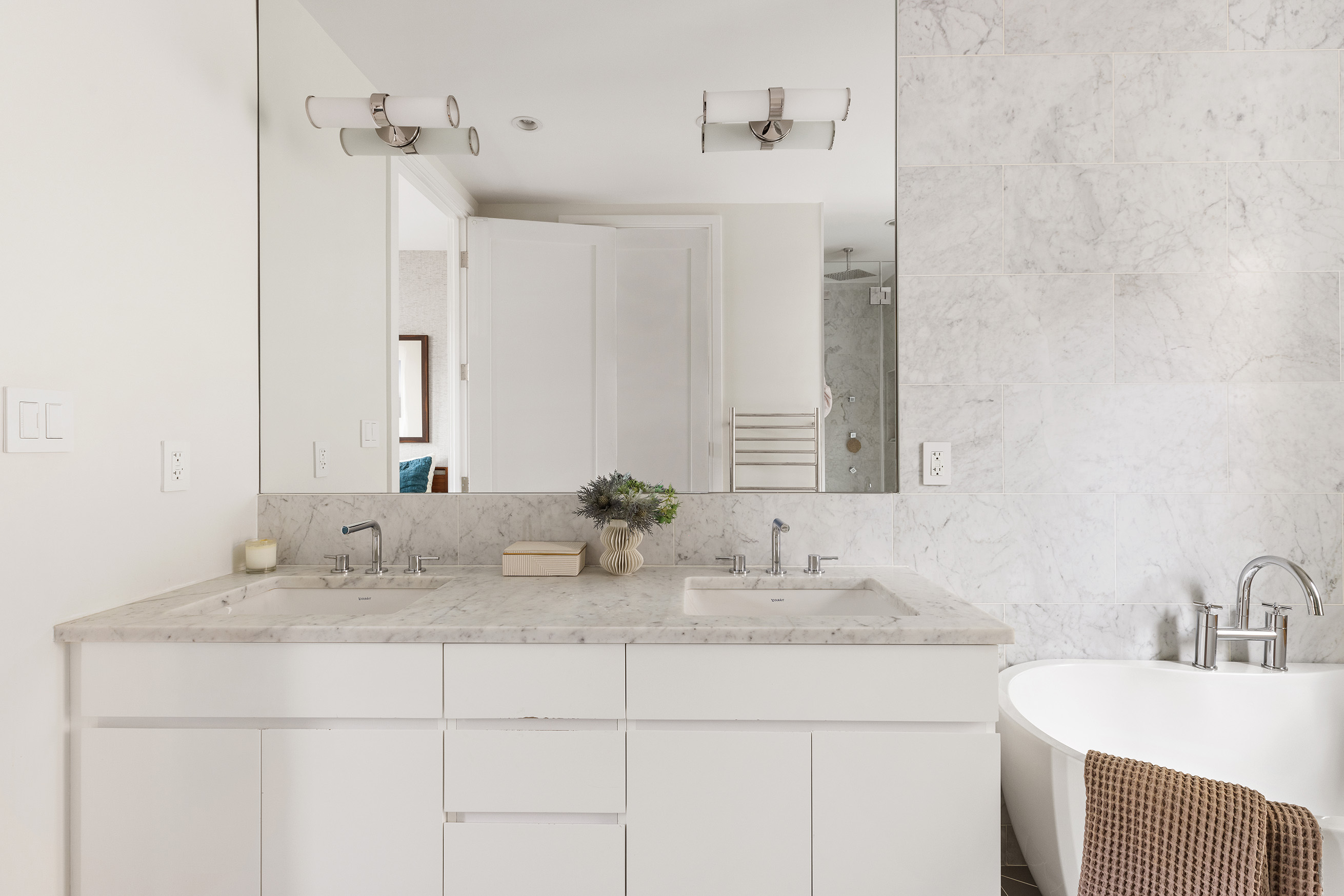 43 Dean Street Brooklyn, NY 11201 - Photo 11 of 17 a bathroom with a sink and a mirror