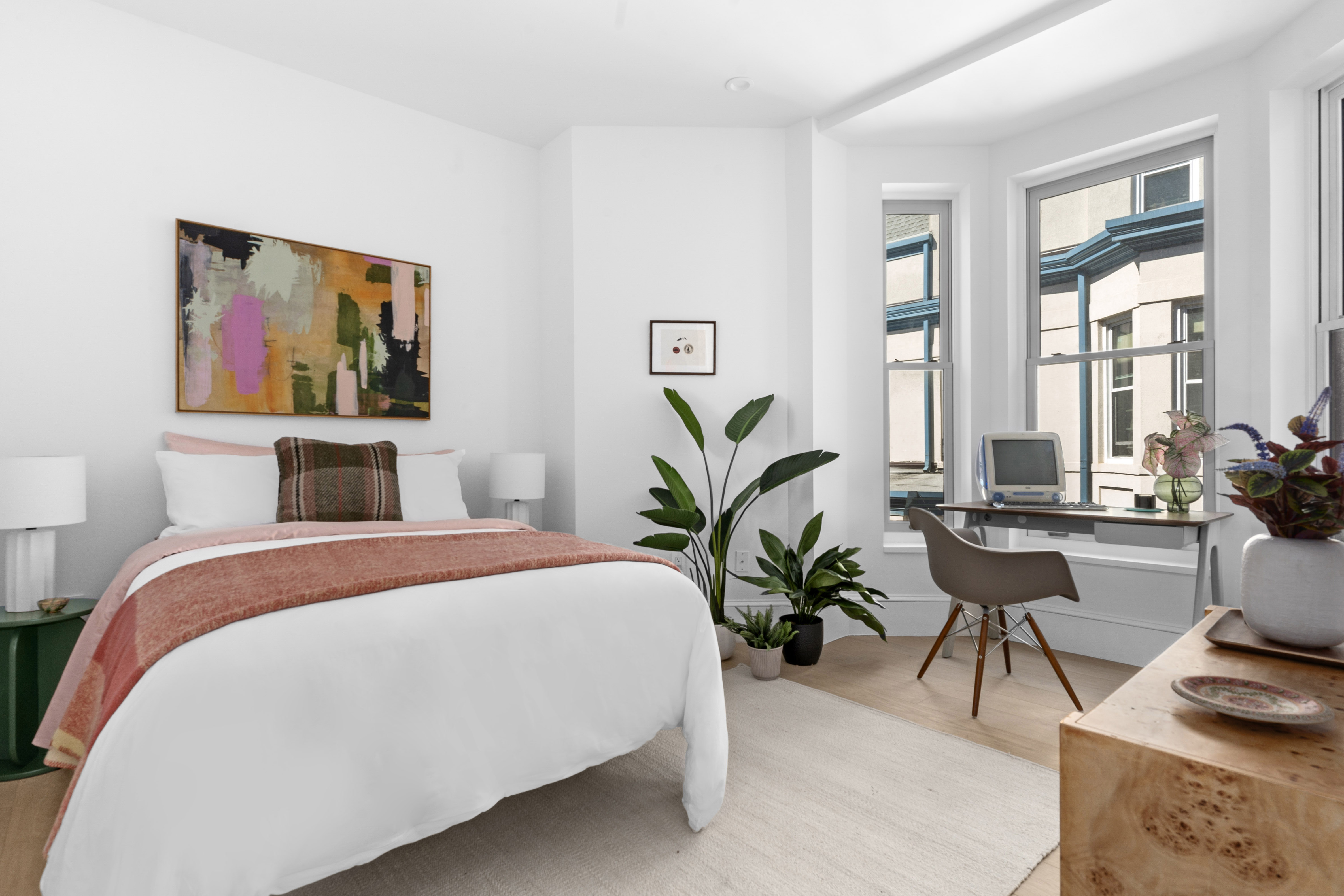 1370 Dean Street, Unit C Brooklyn, NY 11216 - Photo 3 of 7 a bedroom with furniture and a potted plant