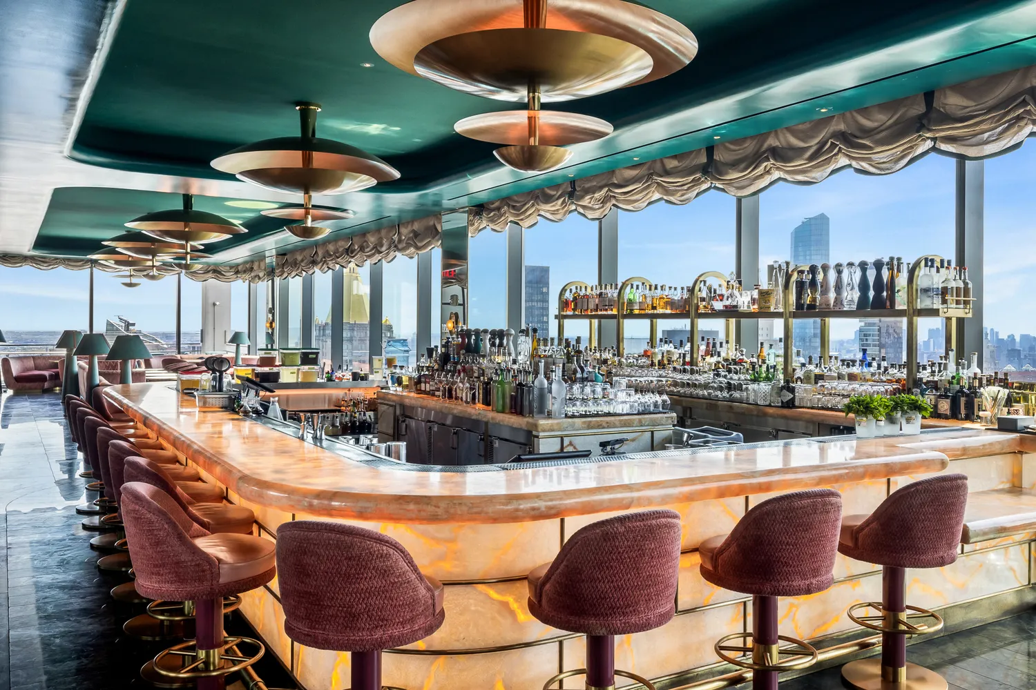 a dining room with tables and chairs