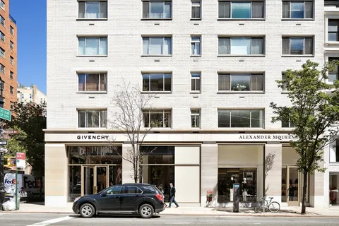a car parked in front of building