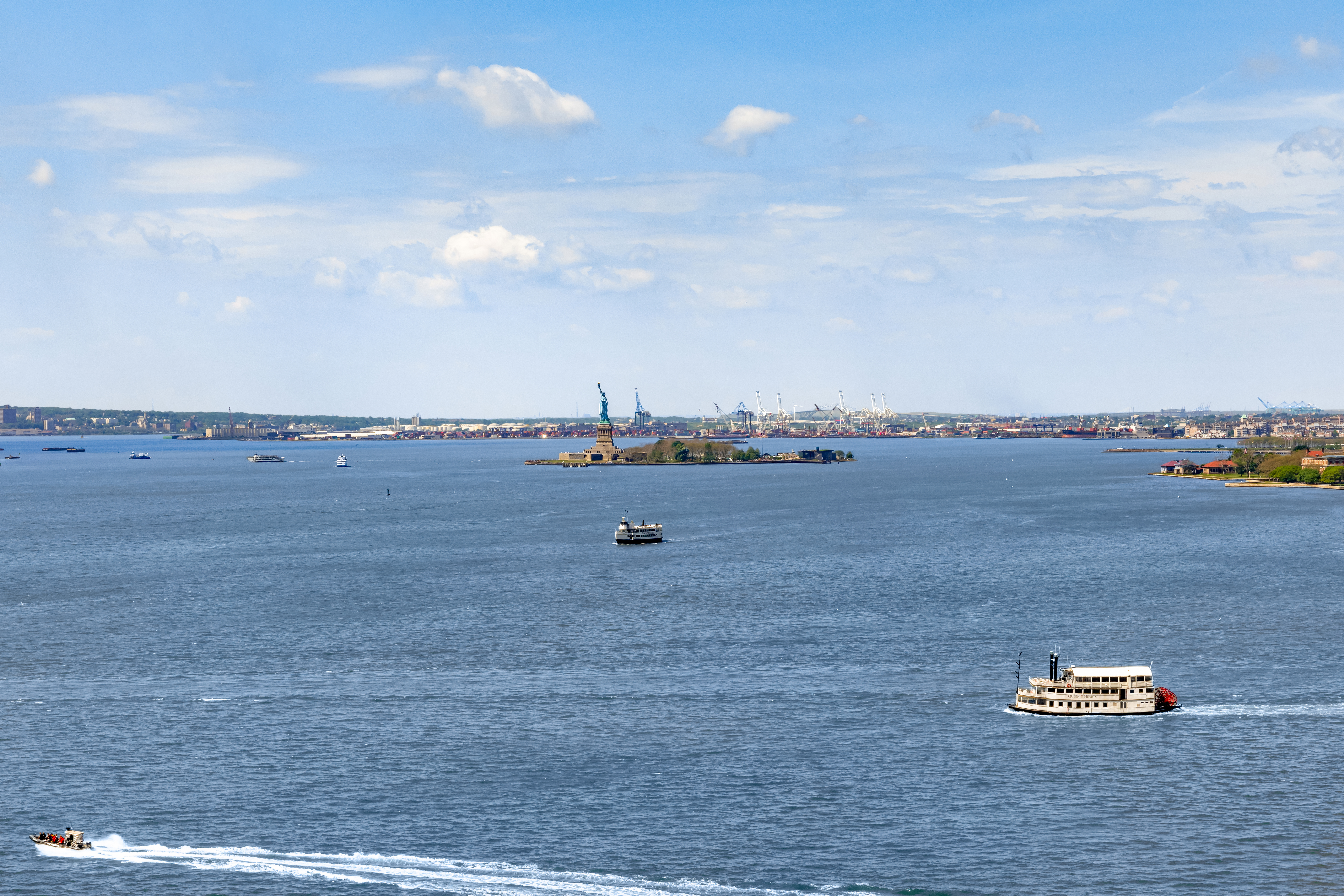 30 West Street, Unit 23F Manhattan, NY 10004 - Photo 11 of 12 a view of a lake and mountain