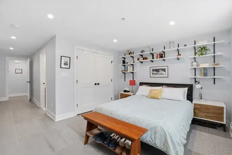 a bedroom with a bed and furniture