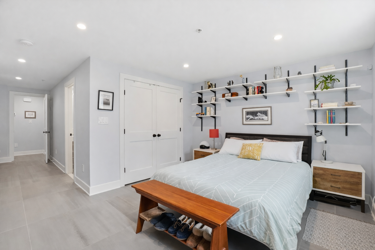 1244 Raum Street Northeast, Unit 5 Washington, DC 20002 - Photo 11 of 21 a bedroom with a bed and furniture