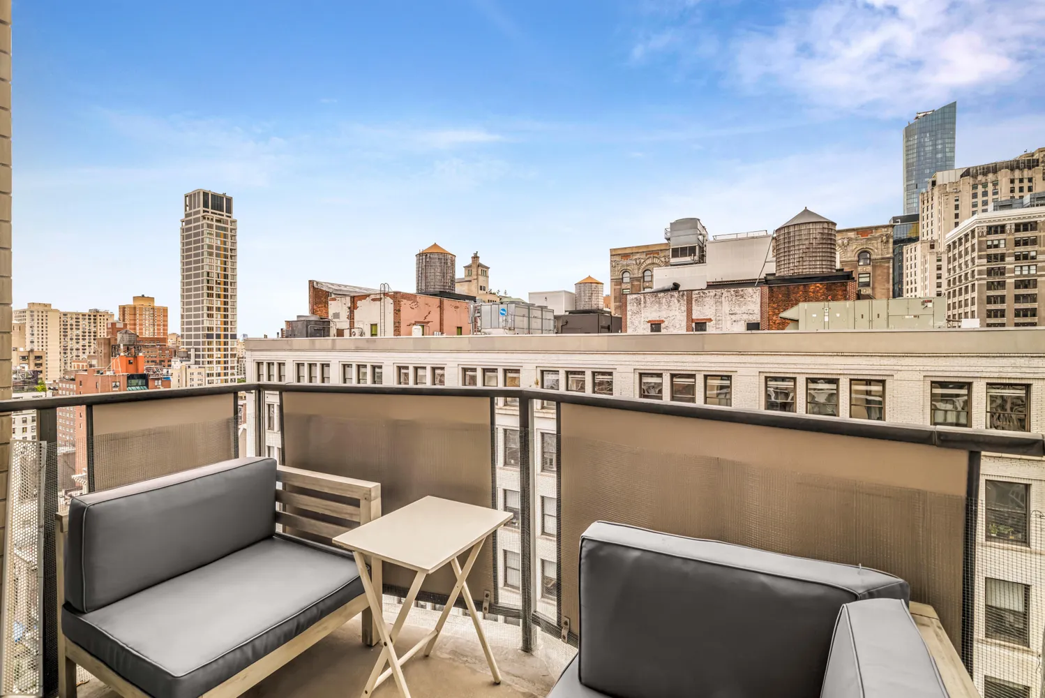 a view of a balcony with city view