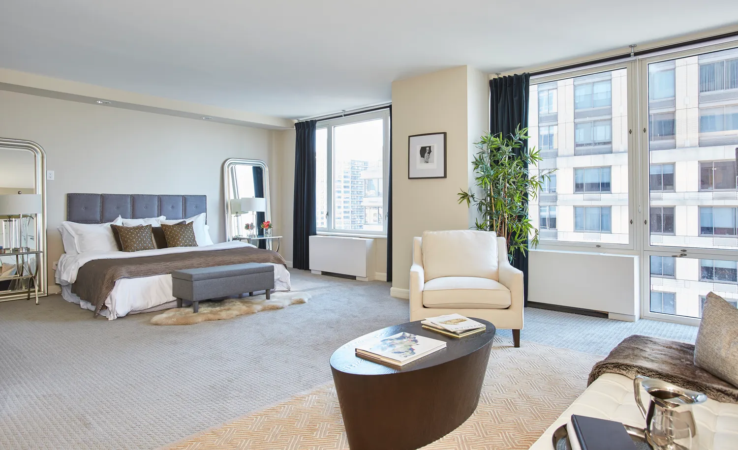 a bedroom with a bed and a couch